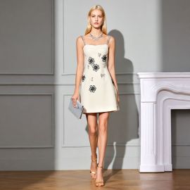 Ivory Spaghetti Strap Dress with Black Floral Embroidery - Elegant A-Line Mini Skirt for Women