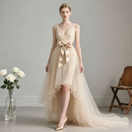 Elegant Champagne Asymmetric Tulle Dress with Satin Bow Belt - Chic High-Low Hem Evening Gown