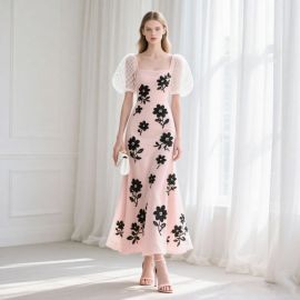 Elegant Pink Midi Dress with Black Floral Embroidery & Sheer Puff Sleeves