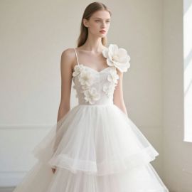 Elegant White Wedding Dress: Spaghetti Straps, Floral Appliqués & Tulle Skirt
