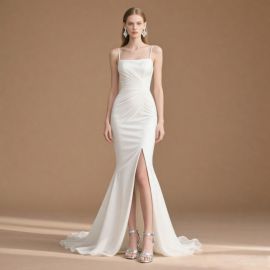 Elegant White Mermaid Gown: Spaghetti Straps, Ruched Bodice, High Slit Evening Dress