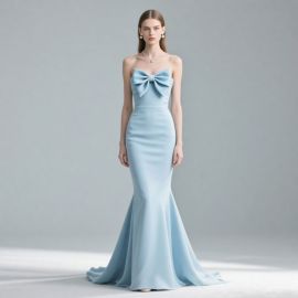 Elegant Light Blue Strapless Mermaid Gown with Oversized Bow Design